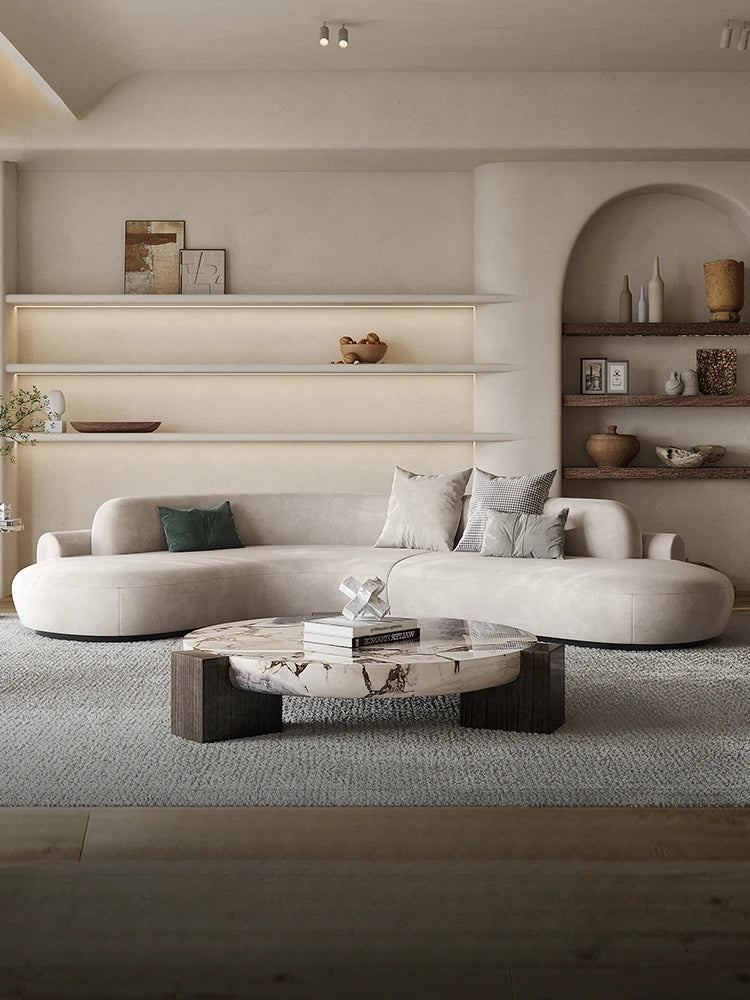 Marble round coffee table is luxurious, quiet and simple. Small apartment in living room, Italian minimalist designer furniture.