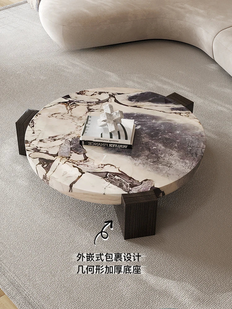 Marble round coffee table is luxurious, quiet and simple. Small apartment in living room, Italian minimalist designer furniture.