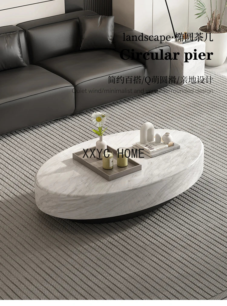 Italian minimalist oval tea table with a marble top