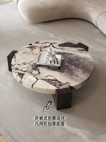 Marble round coffee table is luxurious, quiet and simple. Small apartment in living room, Italian minimalist designer furniture.