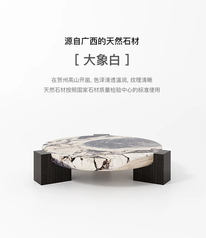 Marble round coffee table is luxurious, quiet and simple. Small apartment in living room, Italian minimalist designer furniture.